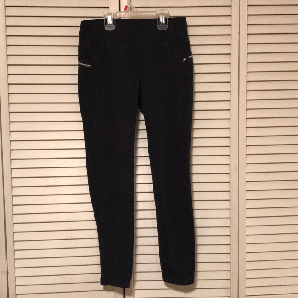 Dark blue fabric leggings with zippers